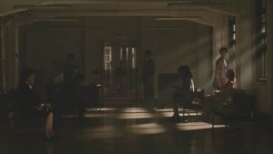 A room full of people but everyone's avoiding eye-contact